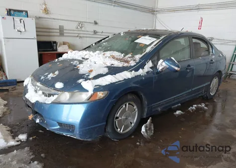 2010 Honda Civic Hybrid from USA, damaged, VIN JHMFA3F23AS004128